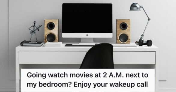 A computer set up on the table with monitor and speakers