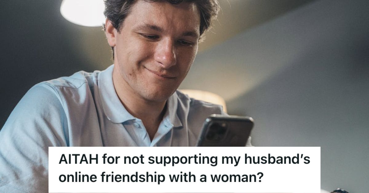 Man looking at his phone smiling