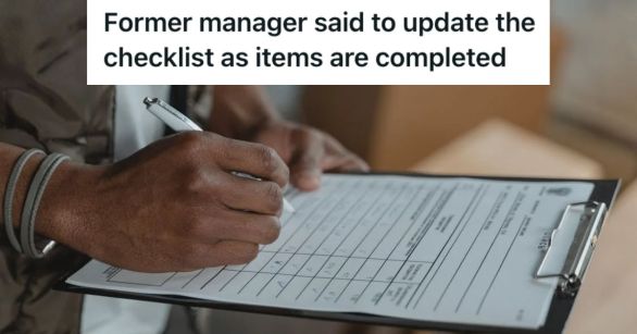 Employee holding and filling out a document