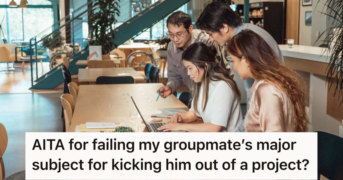 Students huddled together looking at a laptop