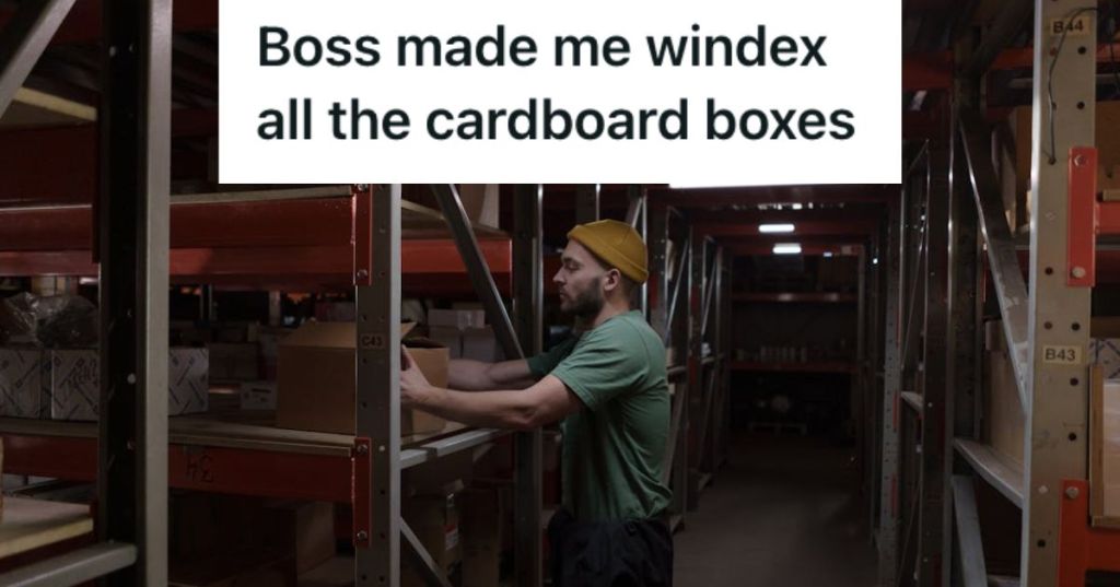 Man fixing boxes in the warehouse