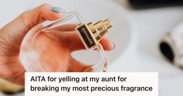 Woman's hand holding a perfume