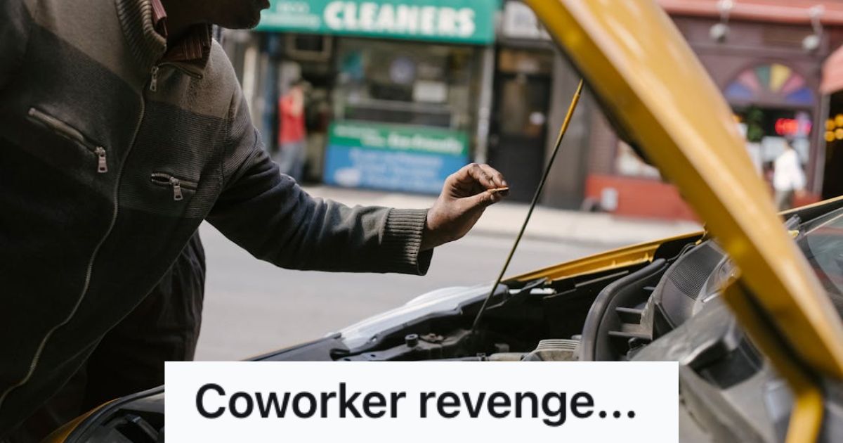 Man tinkering with the hood of the vehicle