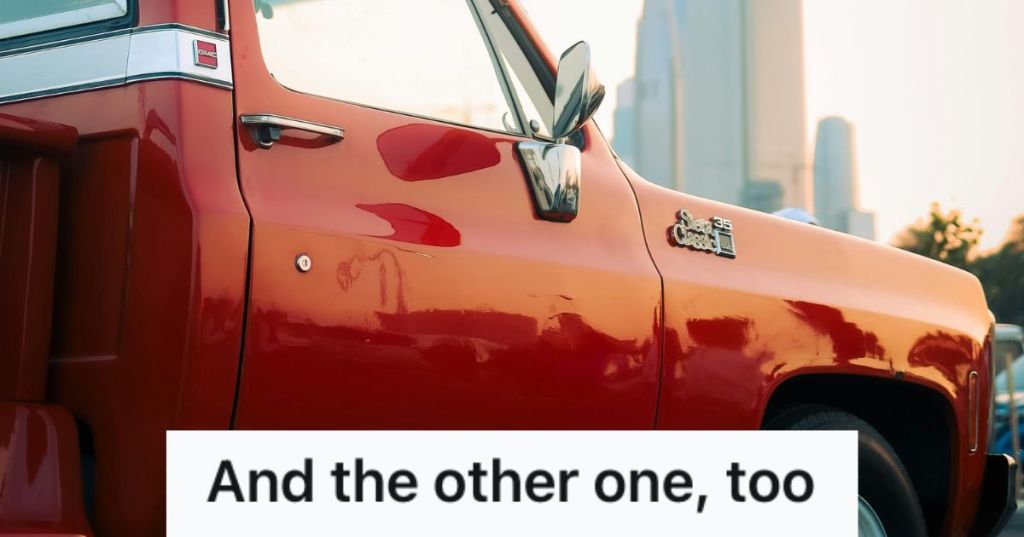 Red pickup truck parked on a lot