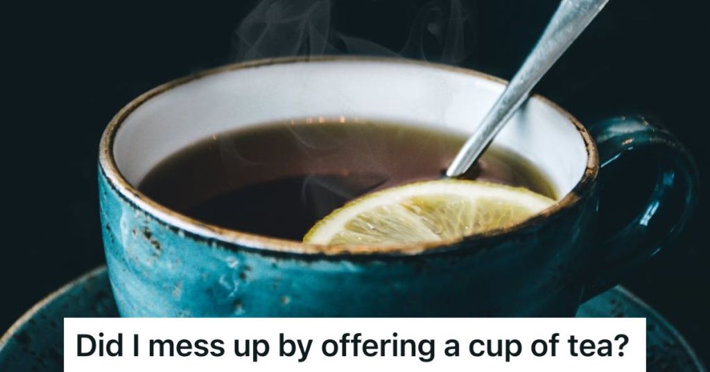 Hot tea with slice of lemon in a blue ceramic cup