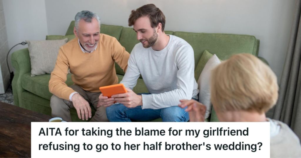 Young man showing some pictures to older man and woman