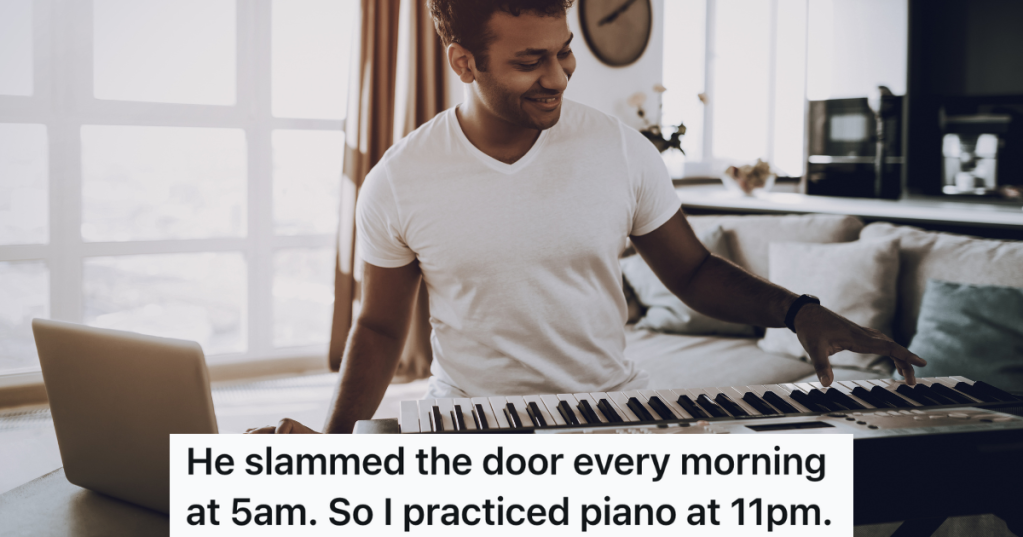 man playing an electric keyboard