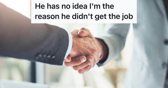 closeup of two men in suits shaking hands