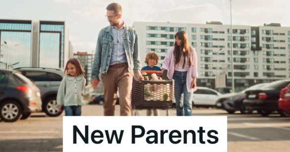 happy family with mom, dad, son and daughter walking to their car