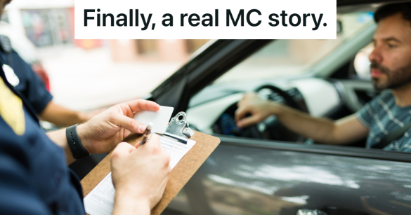 police officer writes ticket while driver sits in car