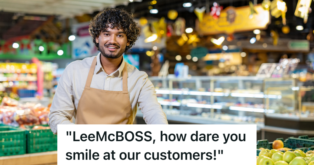 smiling grocery store employee in an apron