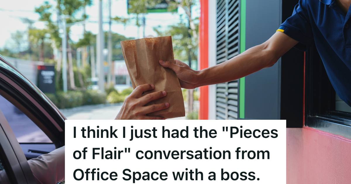 employee hanging bag to customer at drive thru