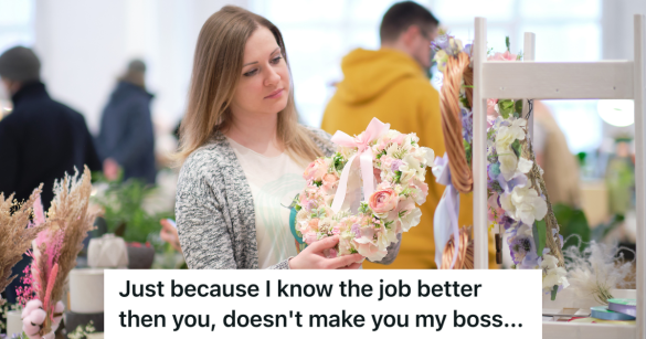 woman holding a floral wreath in a craft store