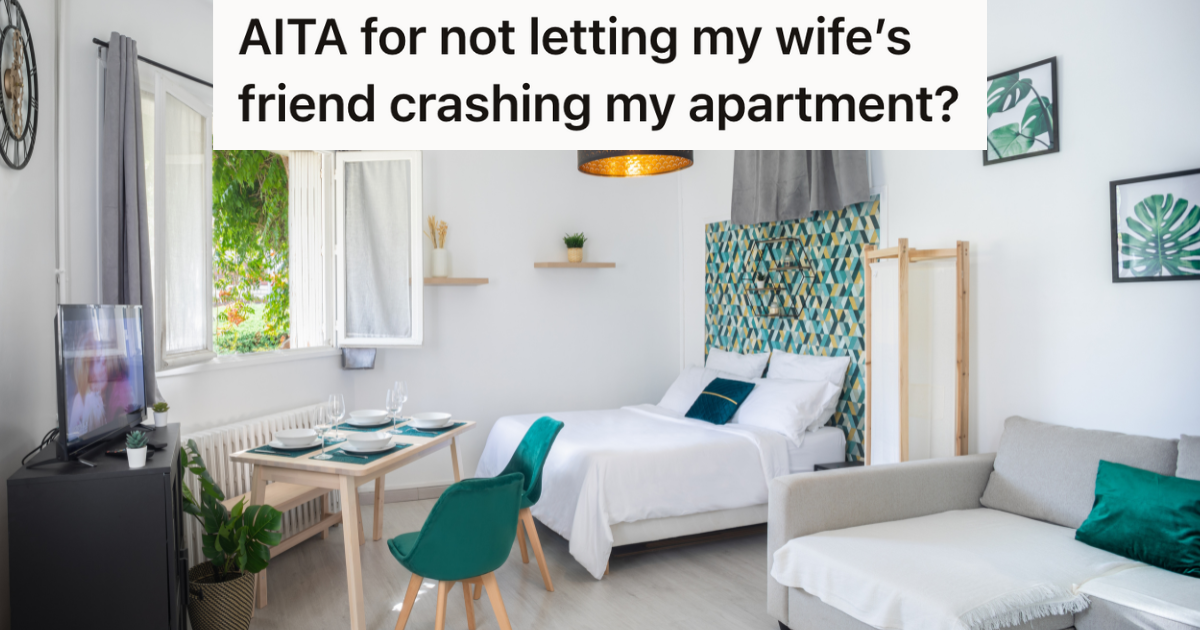 studio apartment with a bed, couch and table