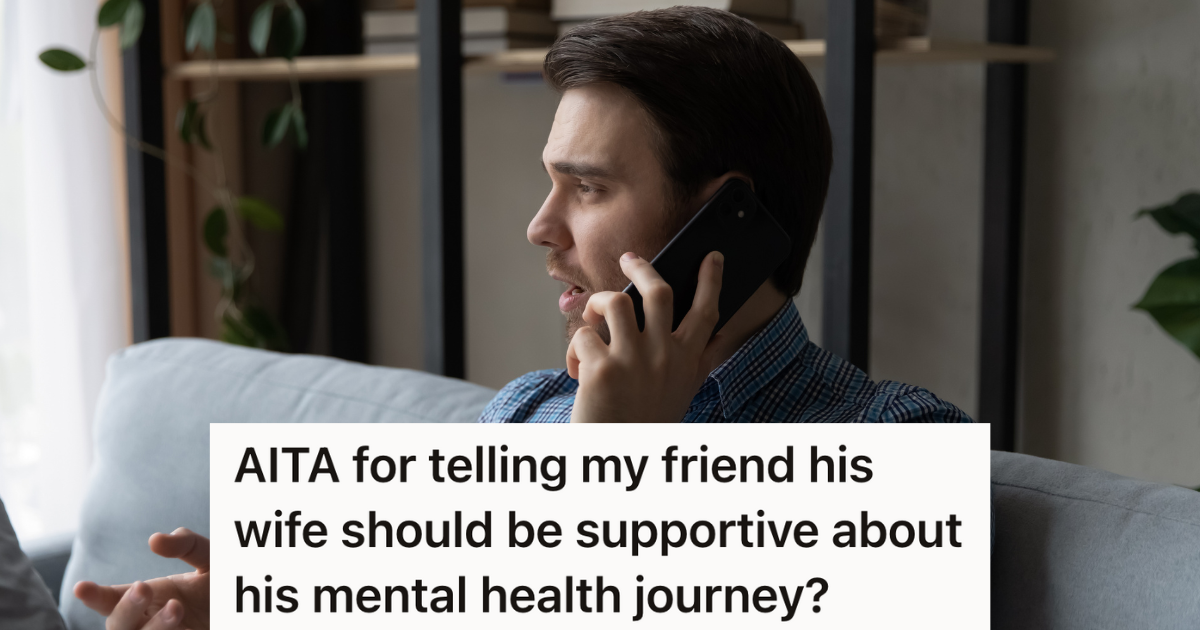 man sitting on a couch talking on the phone