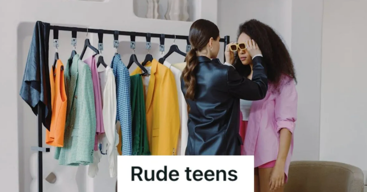 Teenage girls trying on sunglasses in a clothing store