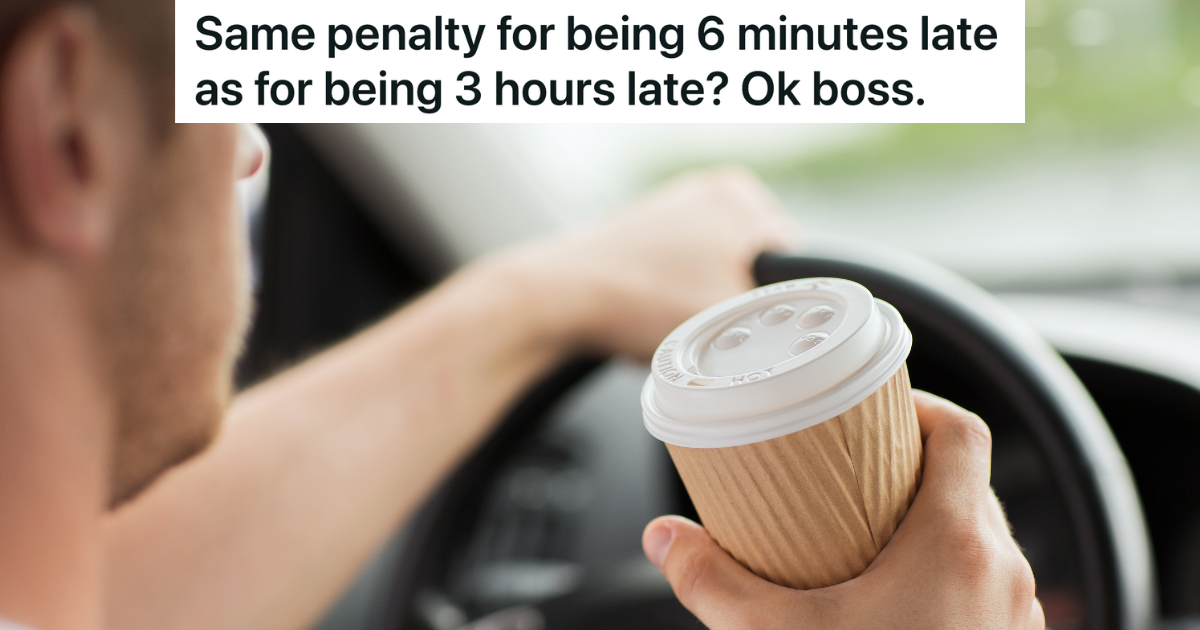 man driving while holding a cup of coffee