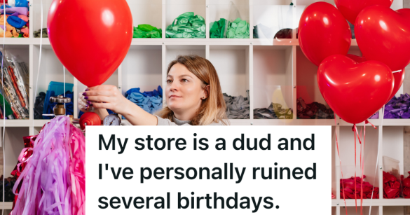 woman inflating a red balloon