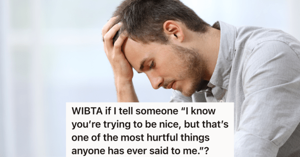 sad man with his hand on his head looking down