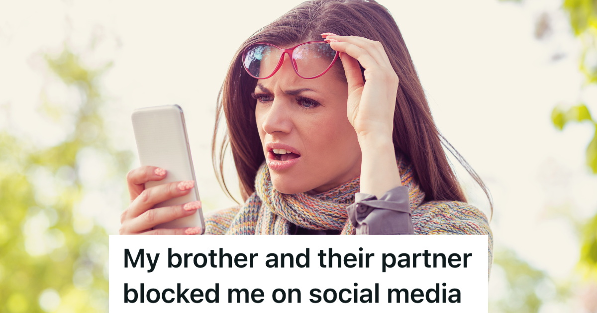 annoyed woman lifting her glasses to look at her phone