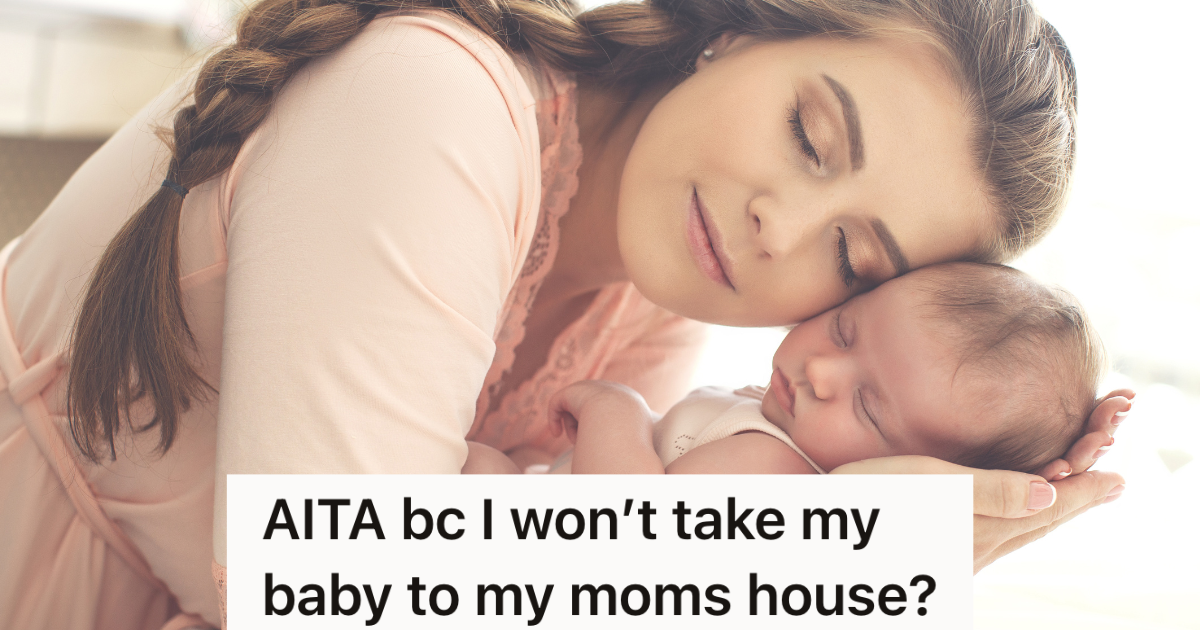 mom holding sleeping baby