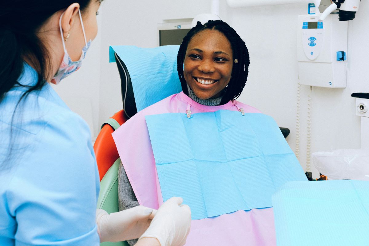 A smiling woman at the dentist