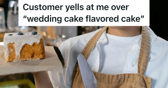 baker holding a slice of cake