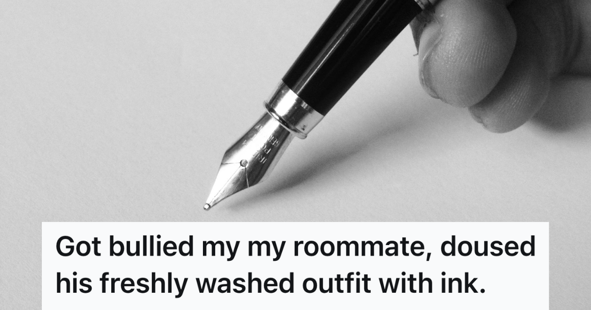 boy holding an ink pen against white paper