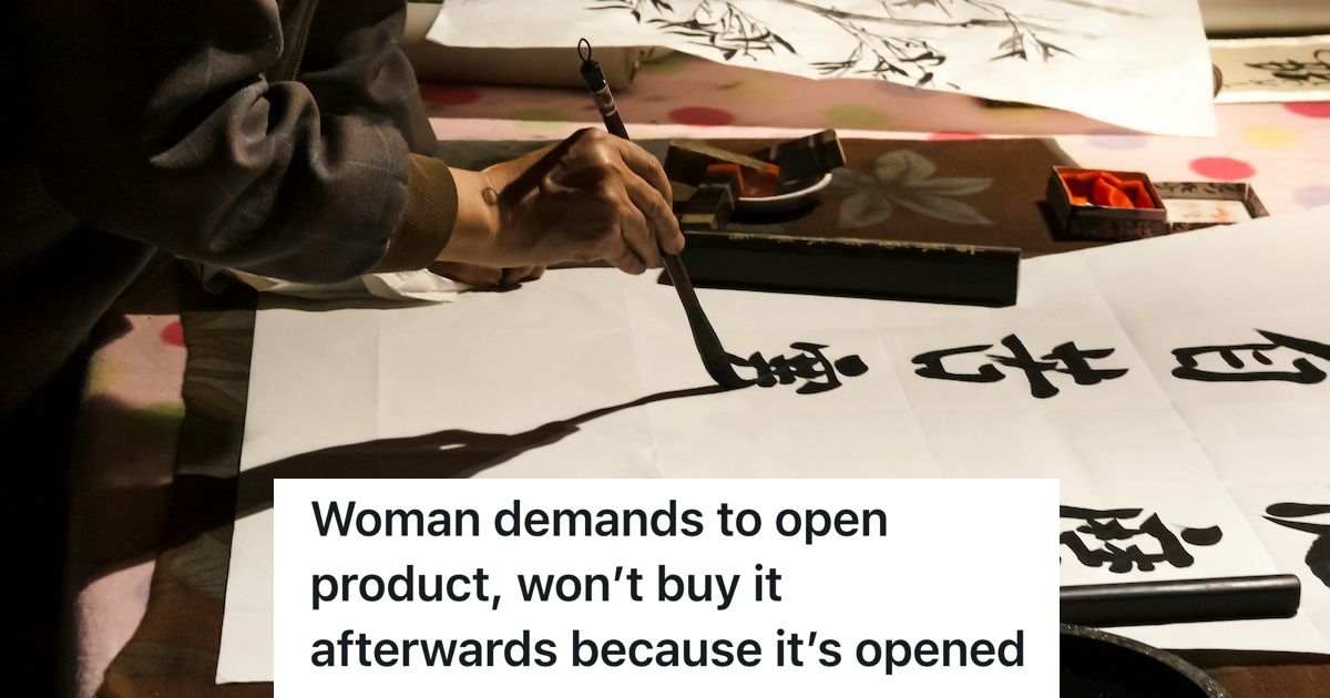 person doing calligraphy