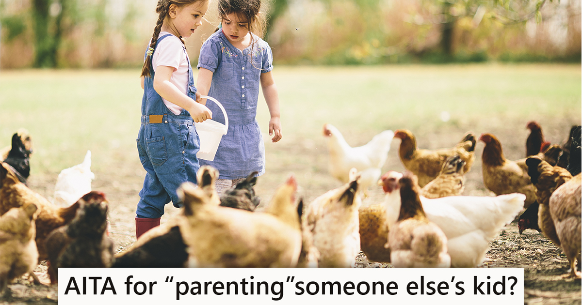 two little girls with a bunch of chicken