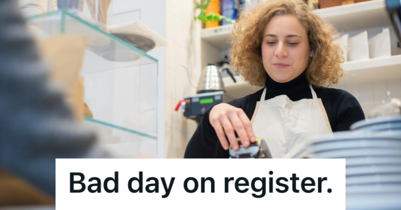 female employee working the cash register