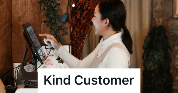 happy woman working the cash register