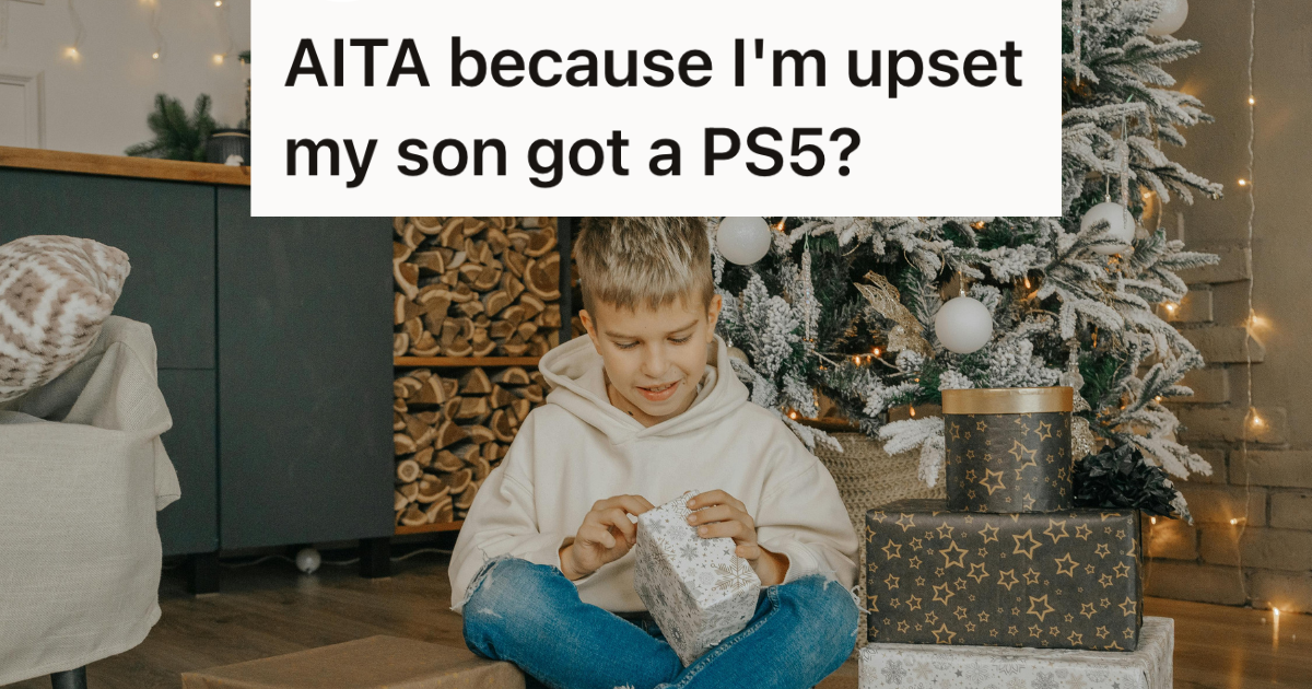 kid opening a christmas gift