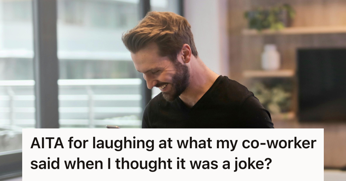 man laughing in a conference room