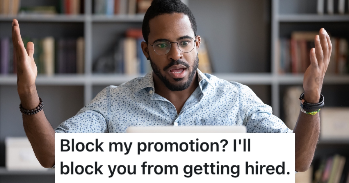 man sitting at a work desk