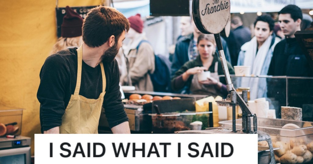 people waiting in a long line at a coffee shop