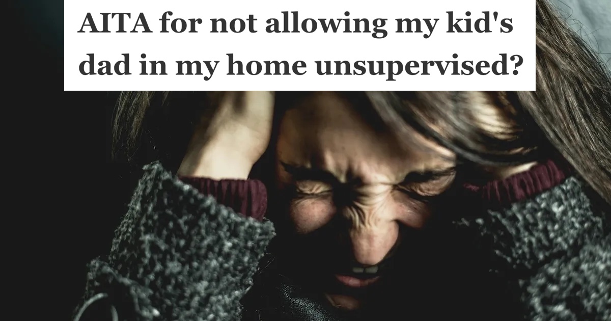 woman holding her hands by her ears screaming