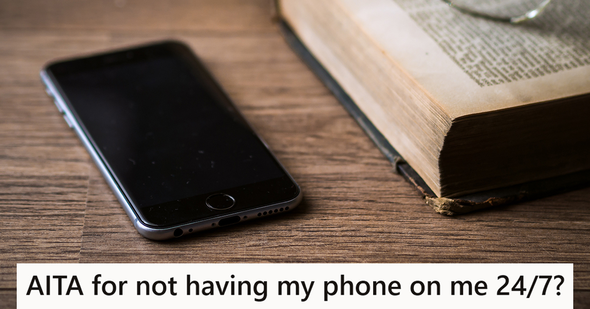 cell phone on a table next to a book