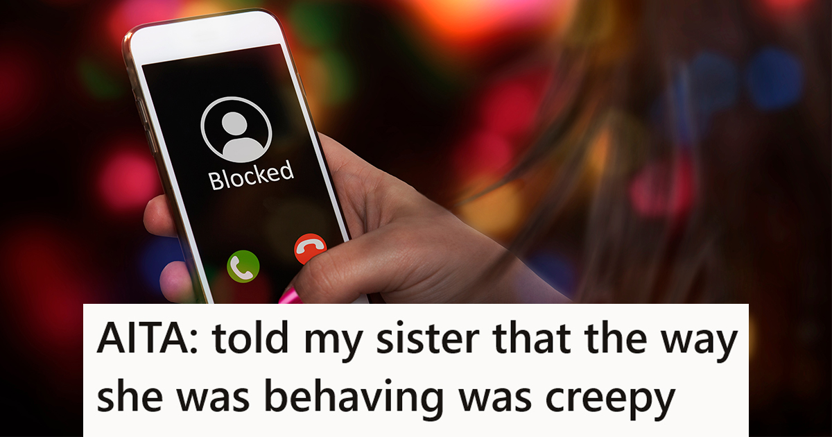 woman's hand holding cell phone that reads "blocked"