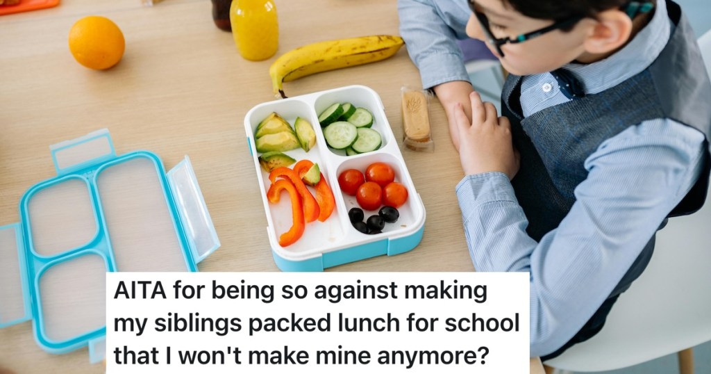 boy sitting at school eating lunch