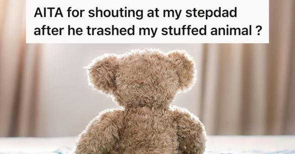 stuffed bear sitting on the bed