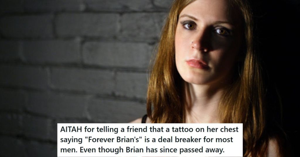 Sad woman with tattoo