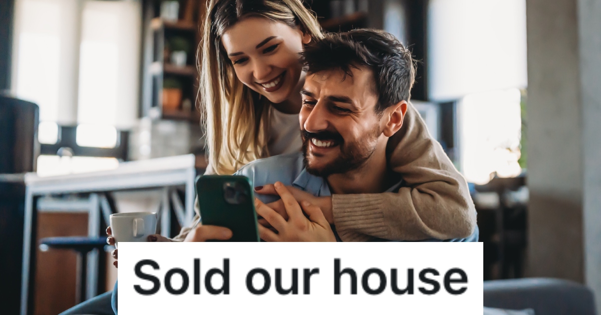 man and woman looking at a phone