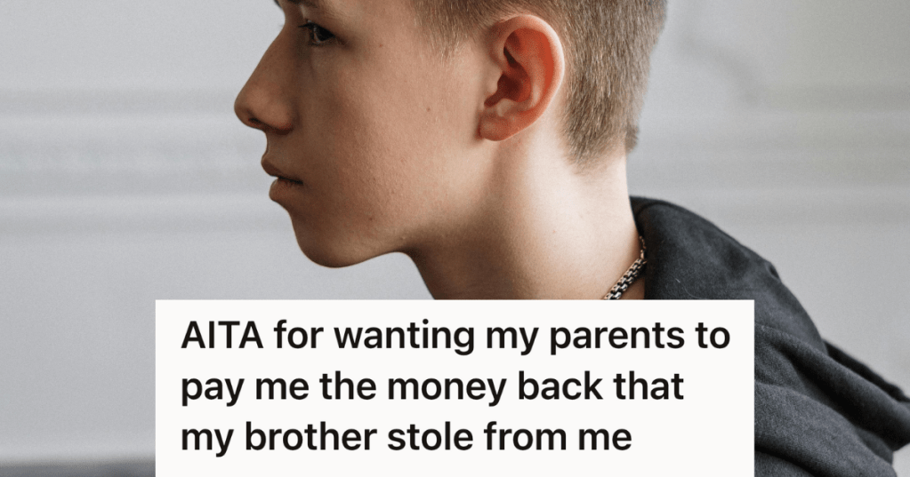 troublemaking teenage boy in black hoodie