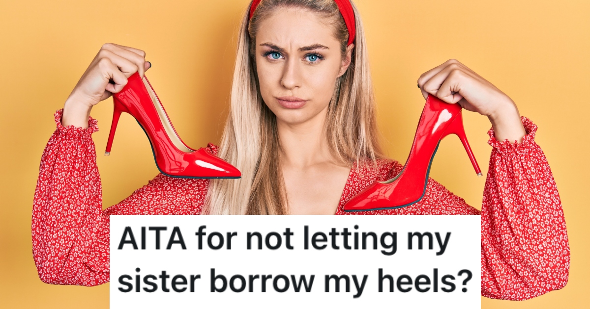 woman holding high heels