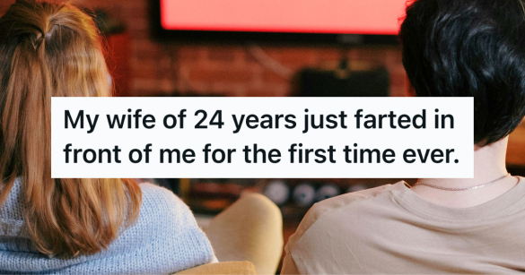 two people sitting on couch watching tv