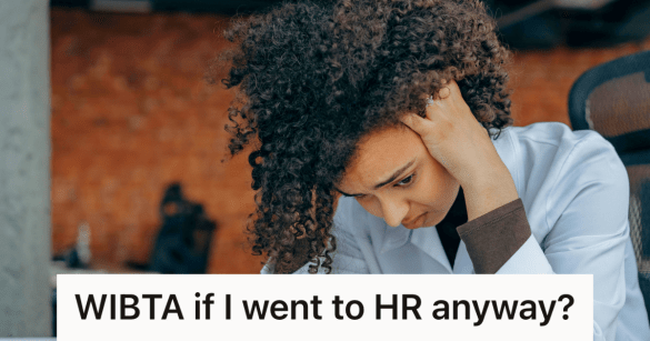 woman looking distressed at work