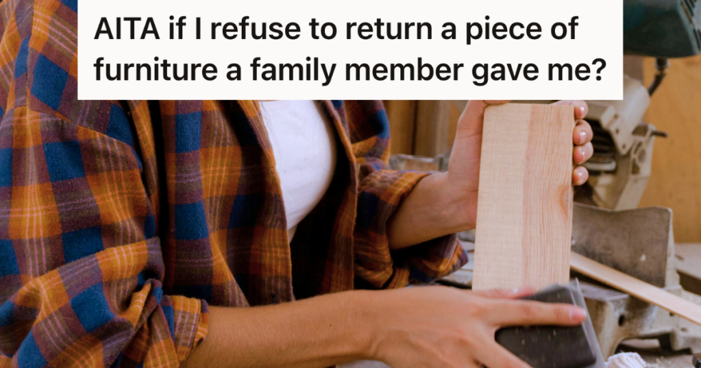 woman sanding a piece of wood