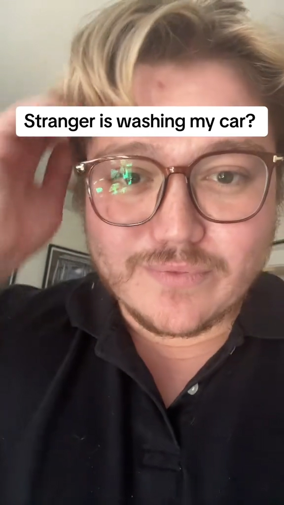 Wyatt watching a man wash his car