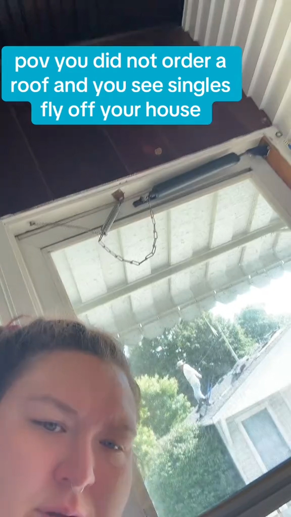 @catnipstg in front of her roof